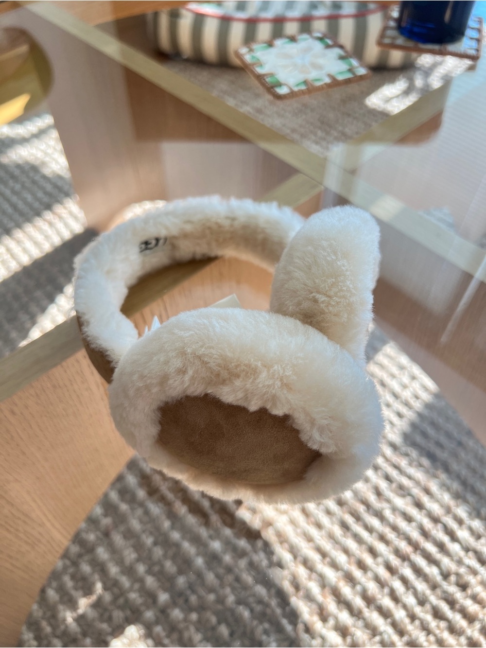 UGG cream & tan sheepskin wireless earmuffs in size OS